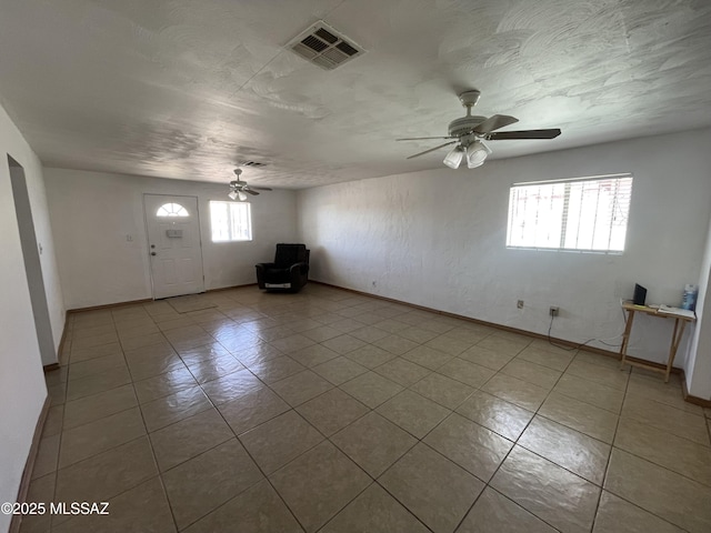 1202 E 26th St, Tucson, AZ 85713 - tiled foyer entrance with ceiling fan and baseboards