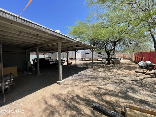 1202 E 26th St, Tucson, AZ 85713 - view of patio featuring a carport