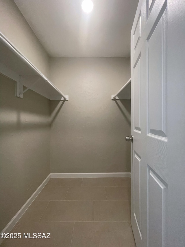 2330 N Los Altos Ave, Tucson, AZ 85705 - spacious closet featuring tile patterned floors