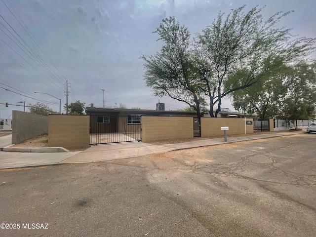 2330 N Los Altos Ave, Tucson, AZ 85705 - view of front of house with a gate