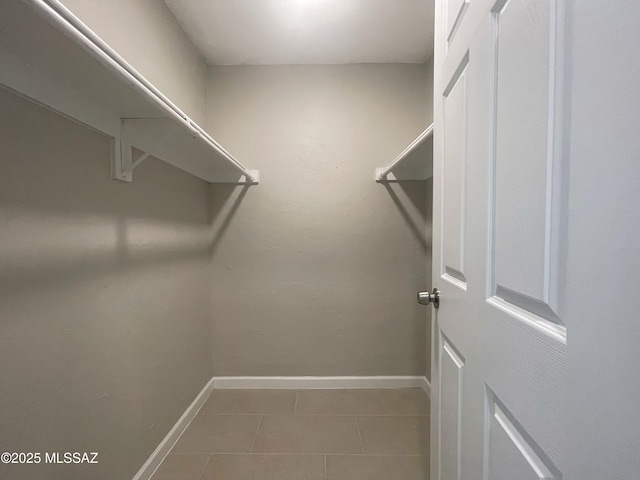 2330 N Los Altos Ave, Tucson, AZ 85705 - walk in closet with tile patterned flooring