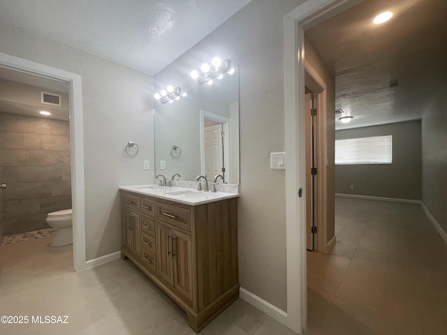 2330 N Los Altos Ave, Tucson, AZ 85705 - full bath with double vanity and tile patterned floors