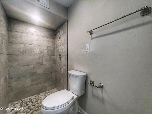 2330 N Los Altos Ave, Tucson, AZ 85705 - bathroom featuring toilet and tiled shower