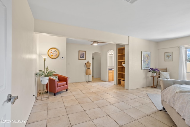 4302 E 6th St, Tucson, AZ 85711 - bedroom with light tile patterned floors and arched walkways