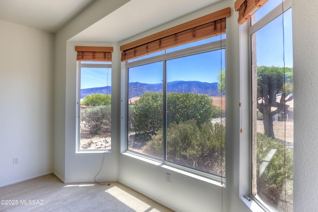2312 E Coreopsis Way, Oro Valley, AZ 85755 - carpeted spare room with a mountain view and healthy amount of natural light