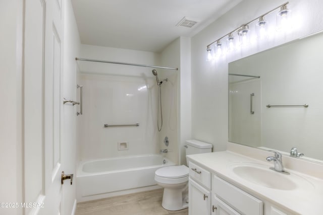 2312 E Coreopsis Way, Oro Valley, AZ 85755 - full bath with vanity, toilet, wood finished floors, and  shower combination