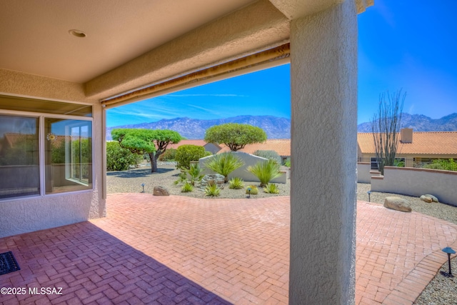 2312 E Coreopsis Way, Oro Valley, AZ 85755 - view of patio with a mountain view