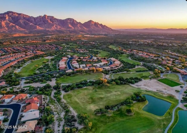 2312 E Coreopsis Way, Oro Valley, AZ 85755 - aerial view at dusk of a residential view and a water and mountain view