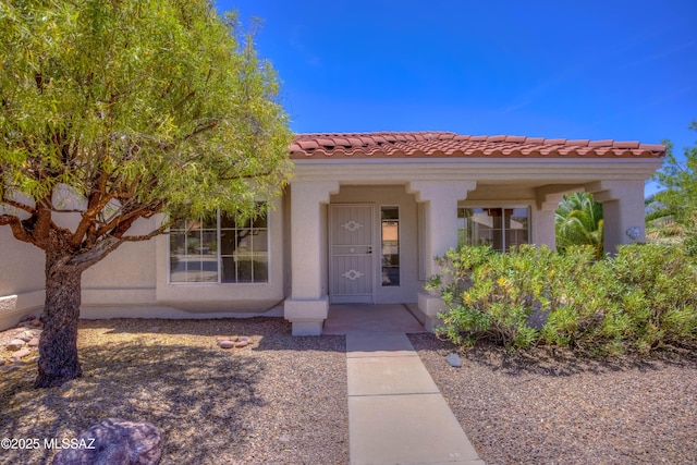 2312 E Coreopsis Way, Oro Valley, AZ 85755 - view of front of property featuring stucco siding and a tiled roof