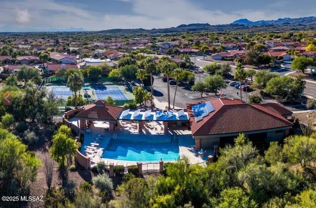 2312 E Coreopsis Way, Oro Valley, AZ 85755 - aerial perspective of suburban area with a mountainous background and a pool