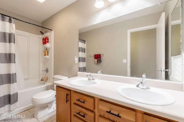 10236 E Rainbow Meadow Dr, Tucson, AZ 85747 - full bathroom featuring double vanity, shower / tub combo, toilet, and tile patterned flooring