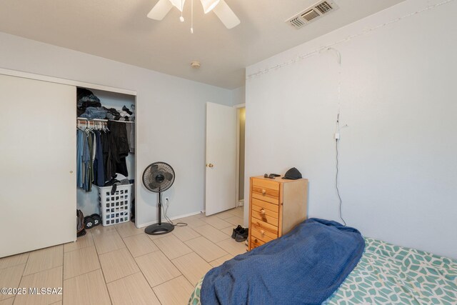 10236 E Rainbow Meadow Dr, Tucson, AZ 85747 - bedroom featuring a closet and a ceiling fan