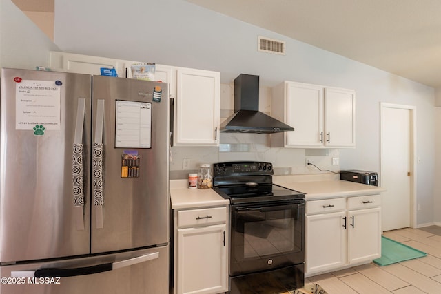 10236 E Rainbow Meadow Dr, Tucson, AZ 85747 - kitchen with freestanding refrigerator, wall chimney exhaust hood, black range with electric stovetop, vaulted ceiling, and light countertops