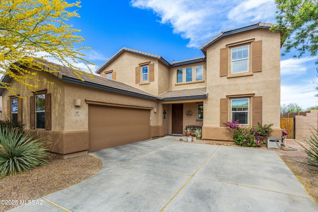 741 S Desert Haven Rd, Vail, AZ 85641 - view of front of house with stucco siding, driveway, a tile roof, and a garage