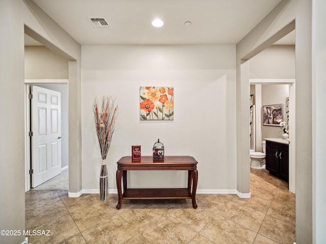 741 S Desert Haven Rd, Vail, AZ 85641 - hallway with light tile patterned floors, baseboards, and recessed lighting