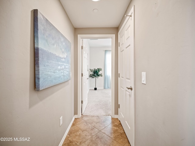 741 S Desert Haven Rd, Vail, AZ 85641 - corridor with baseboards and light tile patterned floors