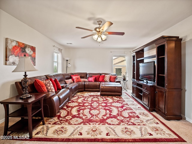 741 S Desert Haven Rd, Vail, AZ 85641 - living room with a ceiling fan, light colored carpet, and baseboards