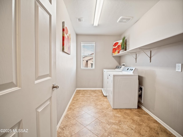 741 S Desert Haven Rd, Vail, AZ 85641 - laundry room with washer and clothes dryer and baseboards