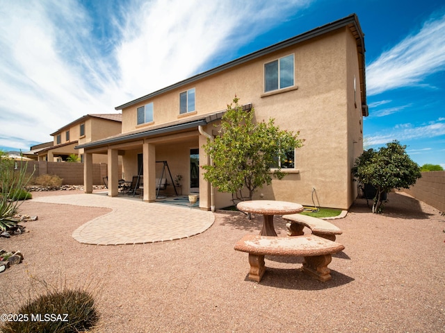 741 S Desert Haven Rd, Vail, AZ 85641 - back of property featuring stucco siding, a patio area, and a fenced backyard