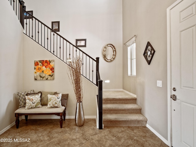 741 S Desert Haven Rd, Vail, AZ 85641 - staircase featuring a high ceiling and baseboards
