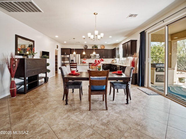 741 S Desert Haven Rd, Vail, AZ 85641 - dining room featuring a chandelier, recessed lighting, and light tile patterned floors