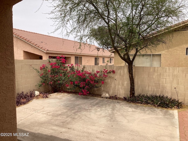 6936 W Sauceda Dr, Tucson, AZ 85743 - fenced backyard featuring a patio