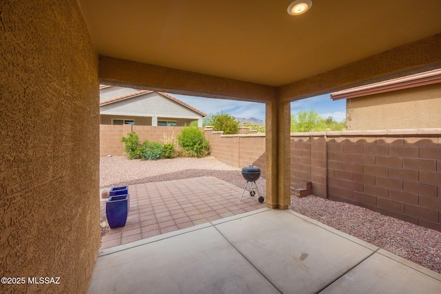 8608 N Genoa Ct, Tucson, AZ 85742 - fenced backyard featuring a patio