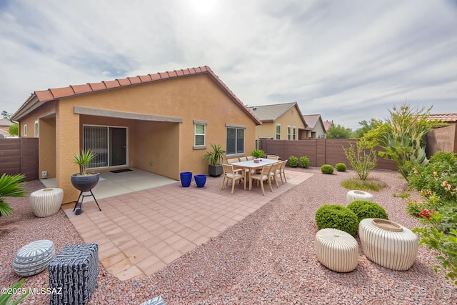 8608 N Genoa Ct, Tucson, AZ 85742 - fenced backyard with a patio area
