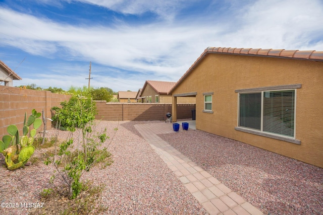 8608 N Genoa Ct, Tucson, AZ 85742 - fenced backyard with a patio area
