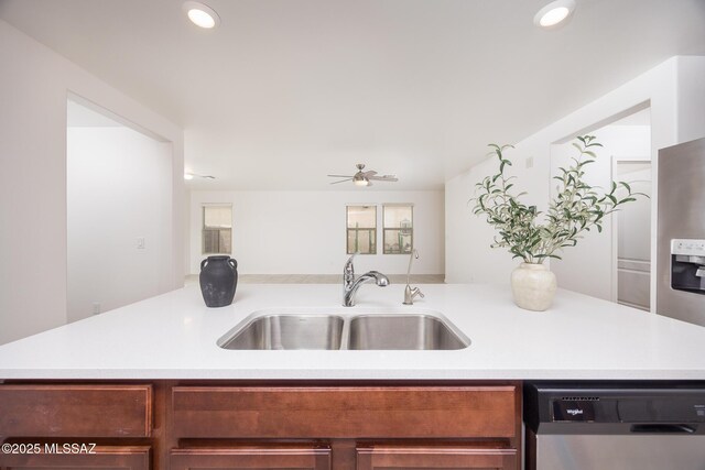 8608 N Genoa Ct, Tucson, AZ 85742 - kitchen with a sink, dishwasher, light countertops, ceiling fan, and recessed lighting