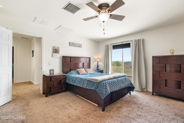 11370 E Creosote Range Dr, Tucson, AZ 85747 - bedroom featuring light carpet, baseboards, and a ceiling fan