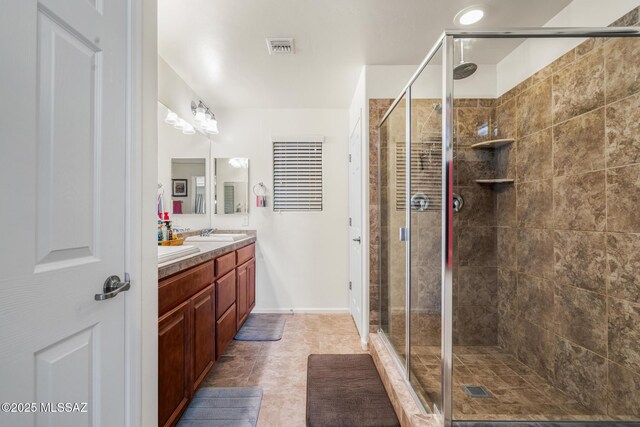 11370 E Creosote Range Dr, Tucson, AZ 85747 - bathroom featuring double vanity and a stall shower