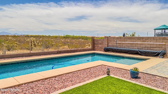 11370 E Creosote Range Dr, Tucson, AZ 85747 - view of pool with a fenced backyard, a patio area, and a mountain view
