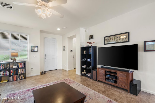 11370 E Creosote Range Dr, Tucson, AZ 85747 - living area featuring a ceiling fan, baseboards, tile patterned flooring, and recessed lighting