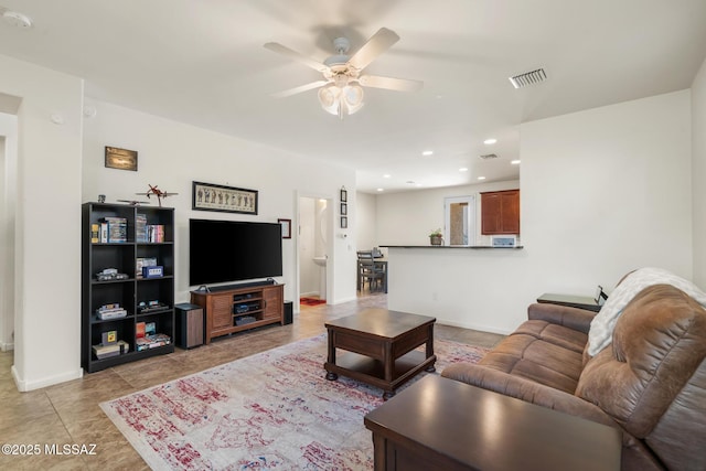 11370 E Creosote Range Dr, Tucson, AZ 85747 - living area with a ceiling fan, baseboards, light tile patterned floors, and recessed lighting