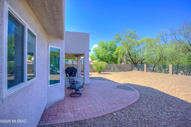 952 S Rincon Rising Rd, Tucson, AZ 85748 - fenced backyard with a patio