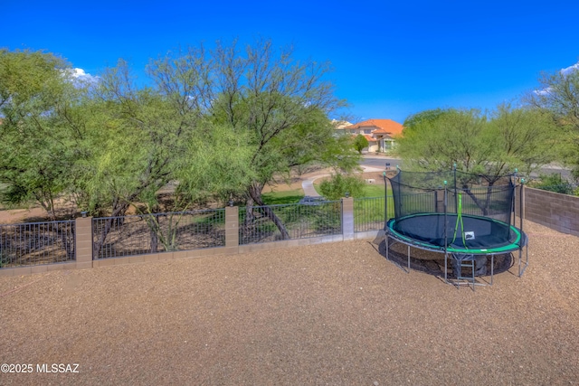 952 S Rincon Rising Rd, Tucson, AZ 85748 - view of yard with a trampoline