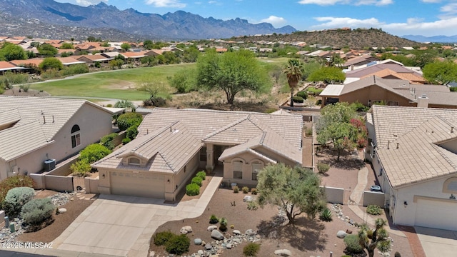 65535 E Rose Ridge Dr, Saddlebrooke, AZ 85739 - aerial view of residential area with mountains