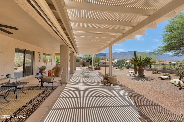 65535 E Rose Ridge Dr, Saddlebrooke, AZ 85739 - view of patio / terrace featuring a mountain view