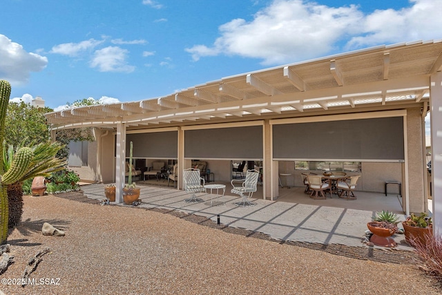 65535 E Rose Ridge Dr, Saddlebrooke, AZ 85739 - rear view of property with outdoor dining area, a pergola, and a patio