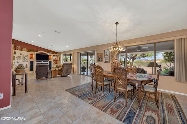 65535 E Rose Ridge Dr, Saddlebrooke, AZ 85739 - dining area featuring light tile patterned flooring, vaulted ceiling, a chandelier, baseboards, and ceiling fan