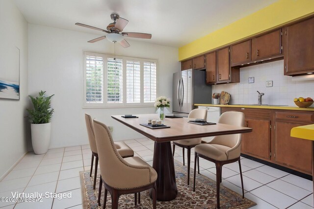 4736 N Calle Lampara, Tucson, AZ 85718 - dining area with a ceiling fan and light tile patterned flooring