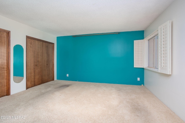 4736 N Calle Lampara, Tucson, AZ 85718 - unfurnished bedroom featuring carpet floors