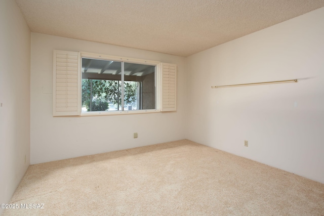 4736 N Calle Lampara, Tucson, AZ 85718 - empty room with carpet floors and a textured ceiling