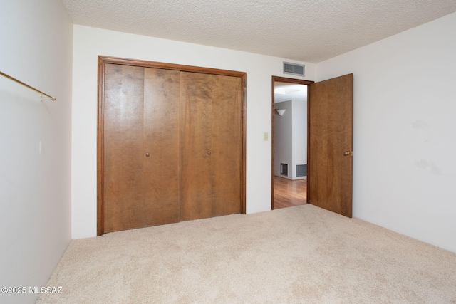 4736 N Calle Lampara, Tucson, AZ 85718 - unfurnished bedroom with a closet and carpet flooring