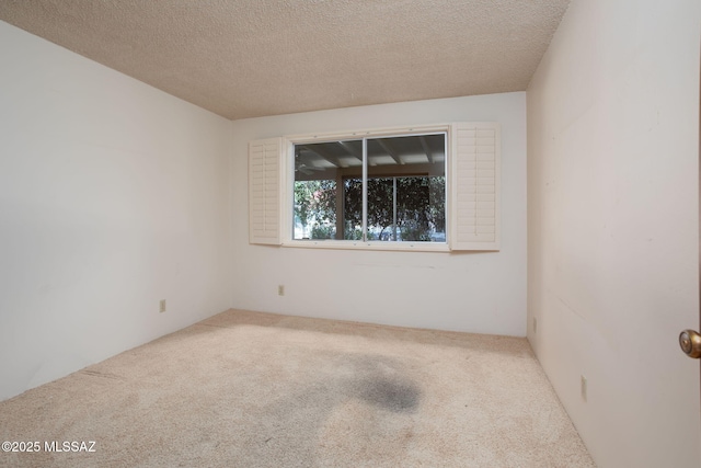 4736 N Calle Lampara, Tucson, AZ 85718 - carpeted spare room with a textured ceiling