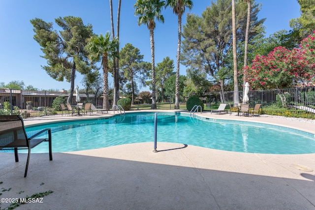 4736 N Calle Lampara, Tucson, AZ 85718 - community pool with a patio
