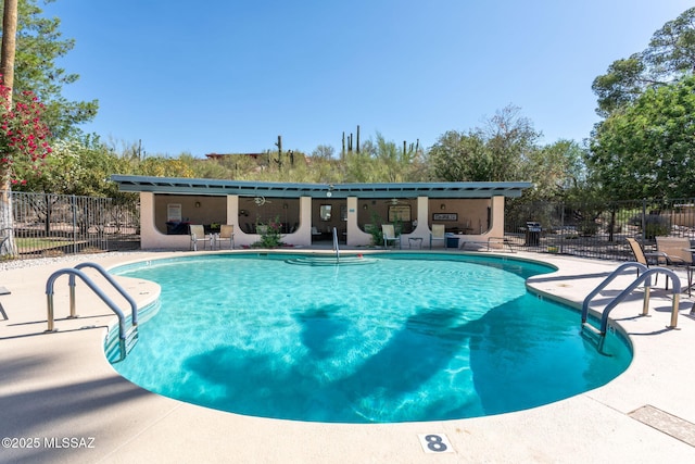 4736 N Calle Lampara, Tucson, AZ 85718 - community pool with a patio