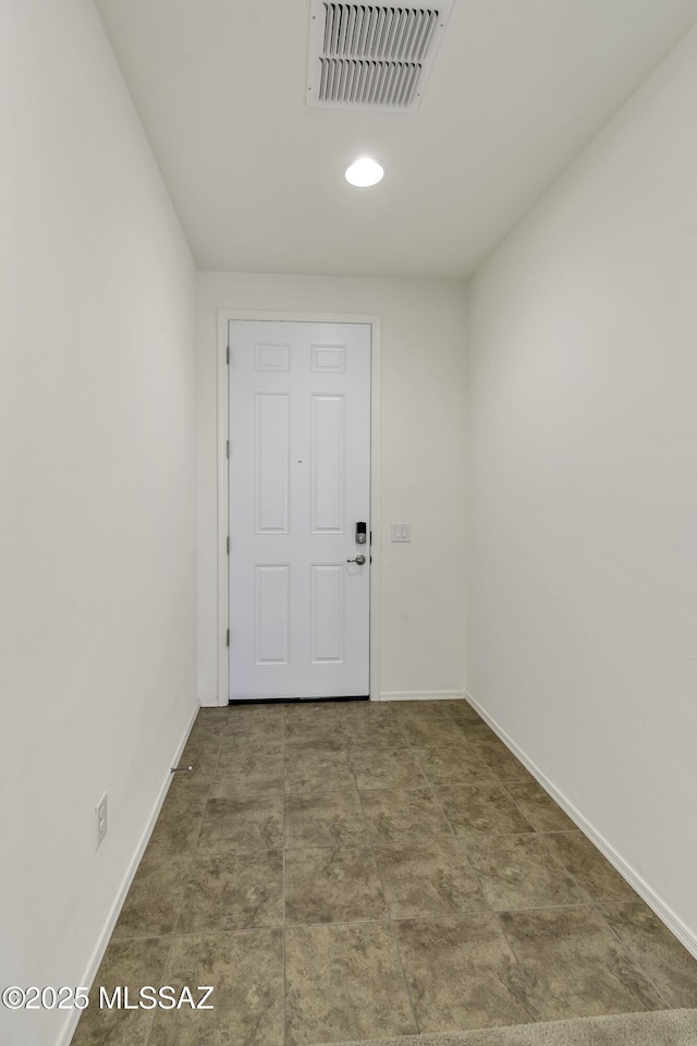 9569 N Sage Vista Ct, Tucson, AZ 85742 - doorway with baseboards