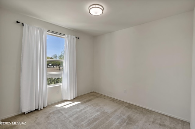 9569 N Sage Vista Ct, Tucson, AZ 85742 - empty room with light colored carpet and baseboards
